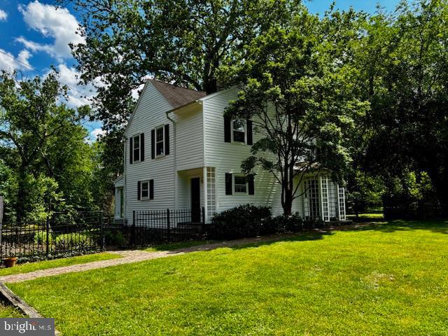 410 Wharf Road, Unit RIVER Bensalem, PA 19020 - Photo 2 of 62 a front view of house with yard and green space