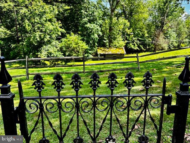 410 Wharf Road, Unit RIVER Bensalem, PA 19020 - Photo 3 of 62 a view of swimming pool with a garden and trees
