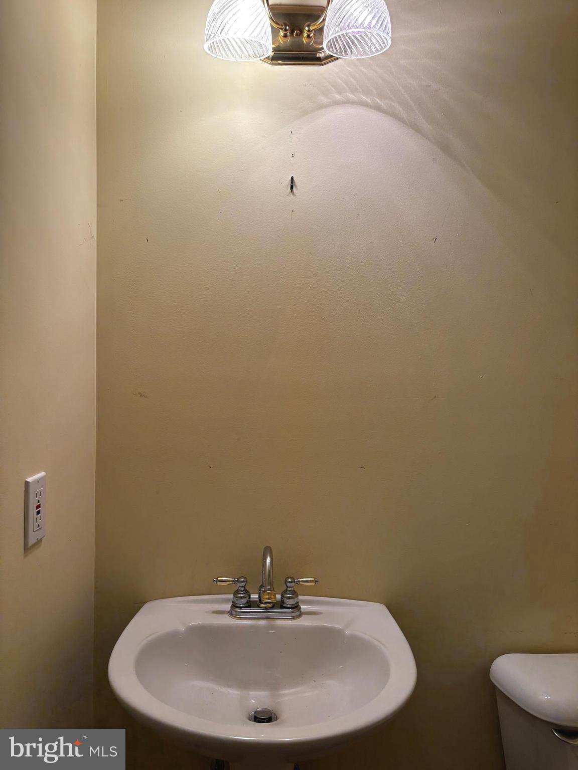 410 Wharf Road, Unit RIVER Bensalem, PA 19020 - Photo 54 of 62 a bathroom with a sink and a mirror