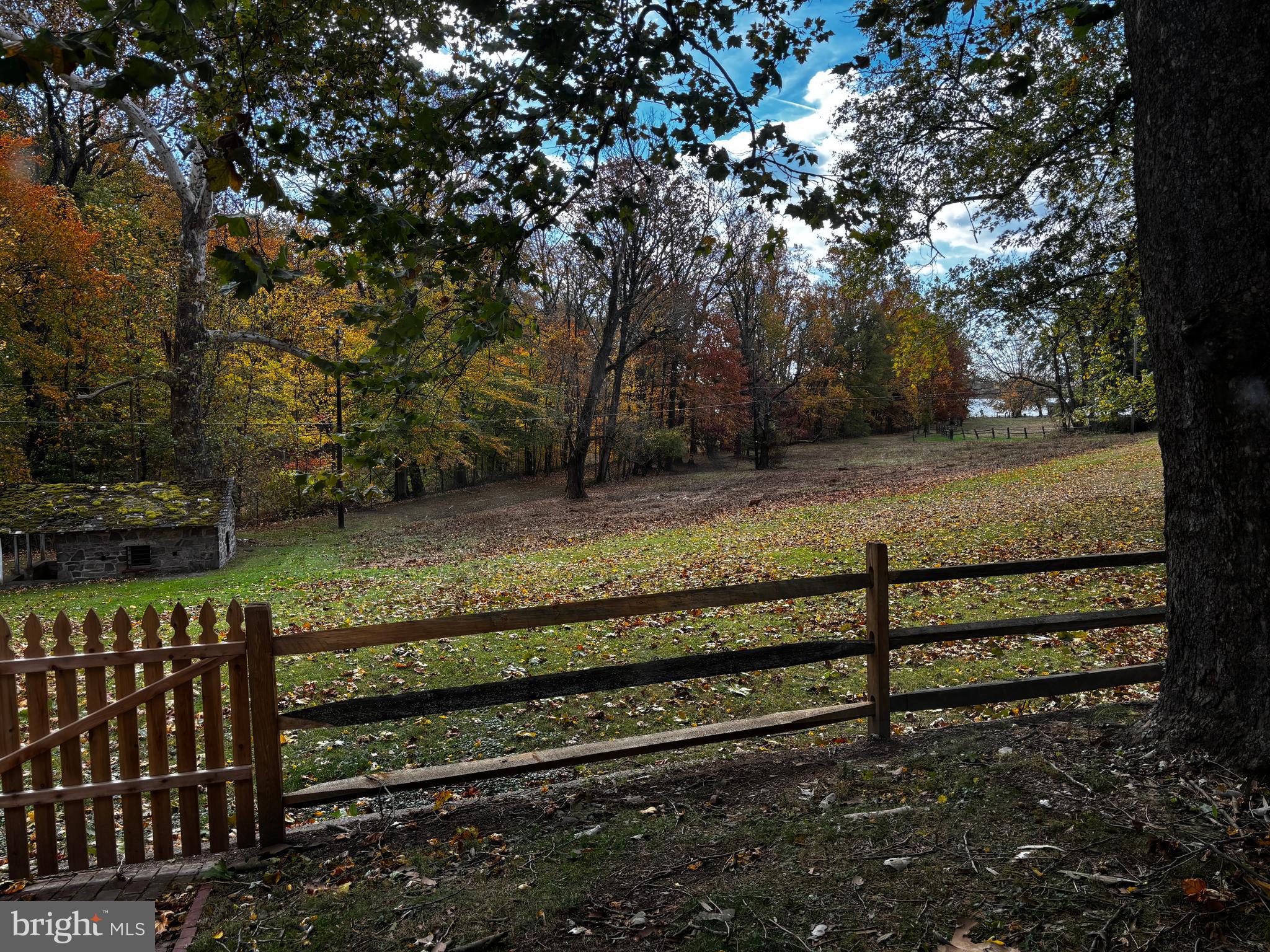 410 Wharf Road, Unit RIVER Bensalem, PA 19020 - Photo 57 of 62 a view of a yard with wooden fence