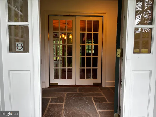 a view of a room with a large window
