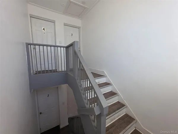 a view of a hallway with entryway