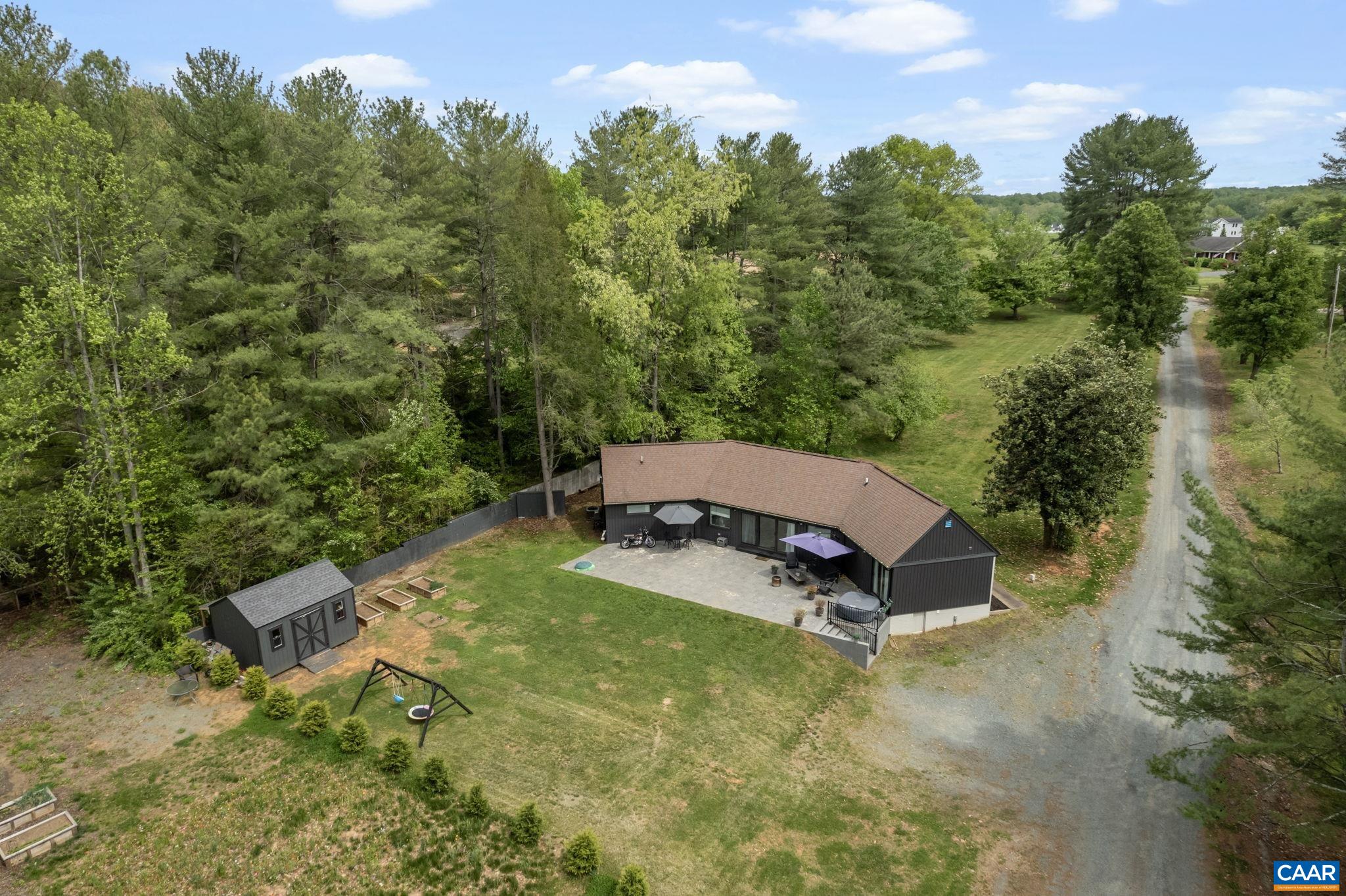 72 Daddy Rabbit Court Ruckersville, VA 22968 - Photo 3 of 71 an aerial view of a house with yard and swimming pool