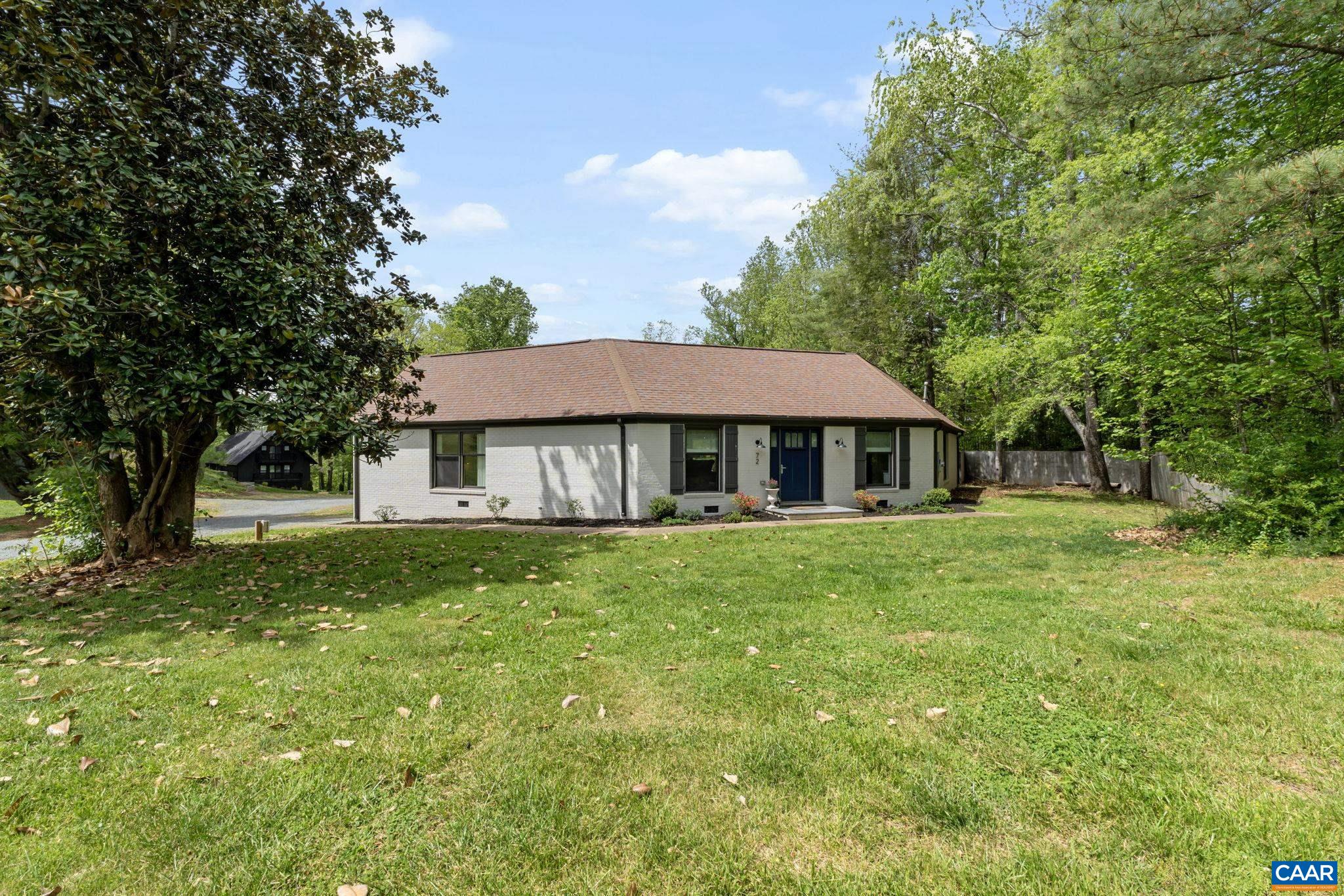 72 Daddy Rabbit Court Ruckersville, VA 22968 - Photo 58 of 71 a front view of a house with garden
