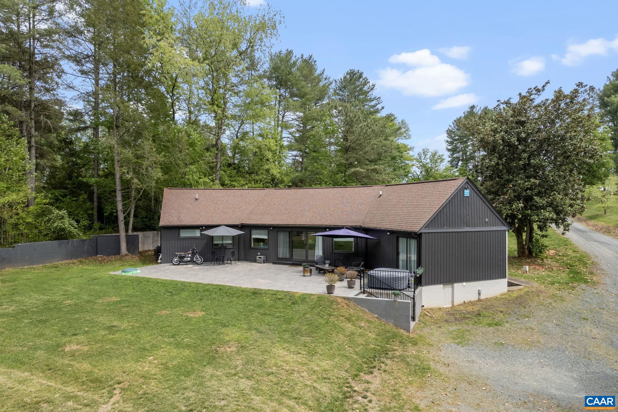 72 Daddy Rabbit Court Ruckersville, VA 22968 - Photo 6 of 71 a swimming pool with outdoor seating and yard