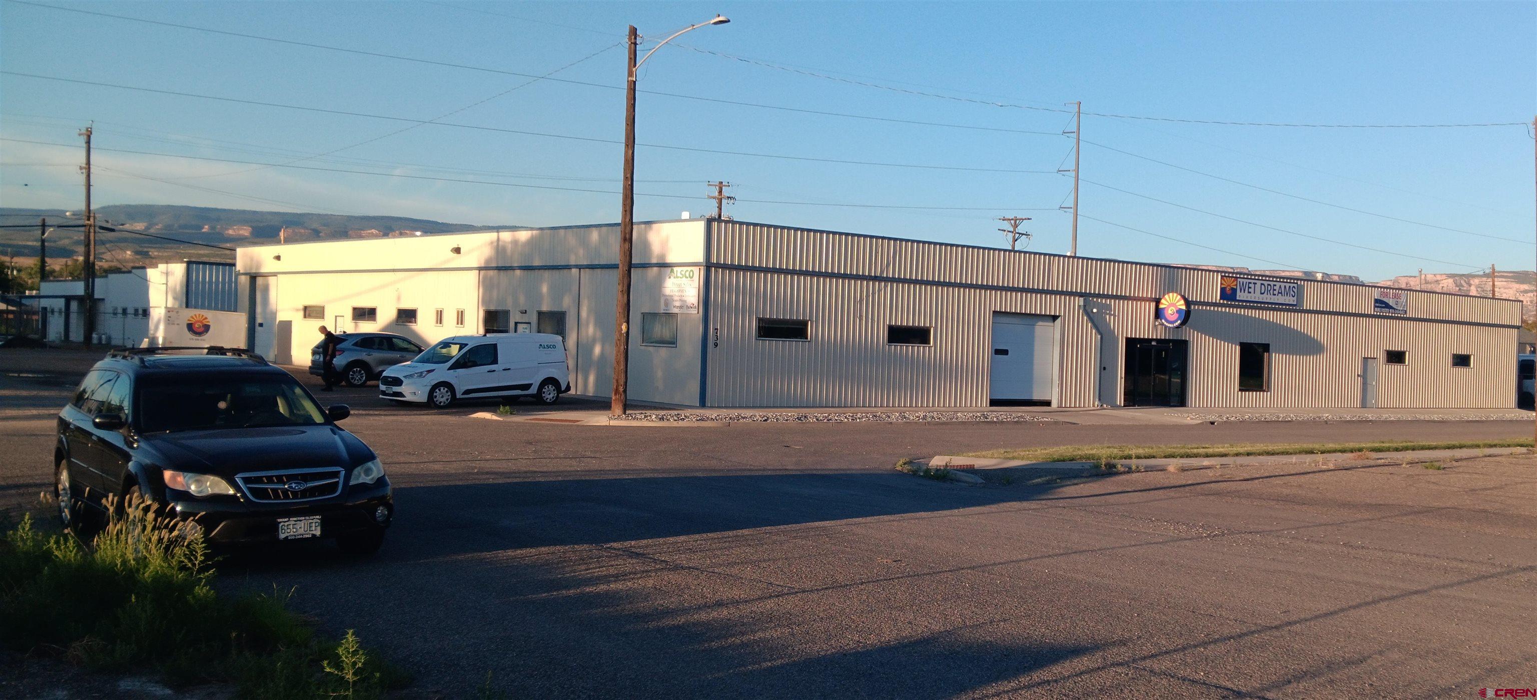 739 3rd Avenue, Unit WEST Grand Junction, CO 81501 - Photo 3 of 3 a front view of a house with sitting area