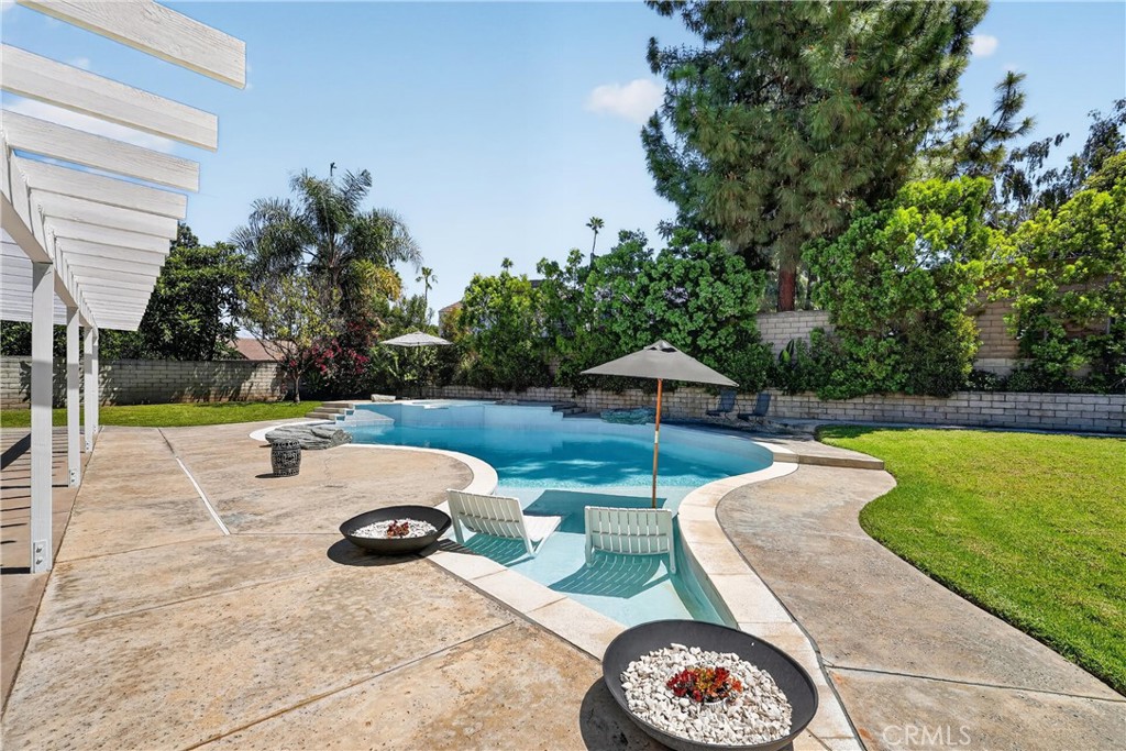 945 Le Conte Drive Riverside, CA 92507 - Photo 32 of 36 Pool has Baja Shelf. These loungers it perfectly