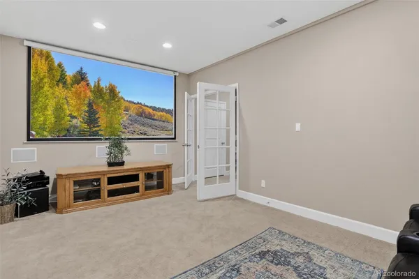 a view of a house with wooden floor and a window