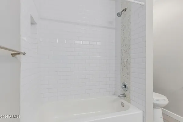 a close up of a bathtub curtain