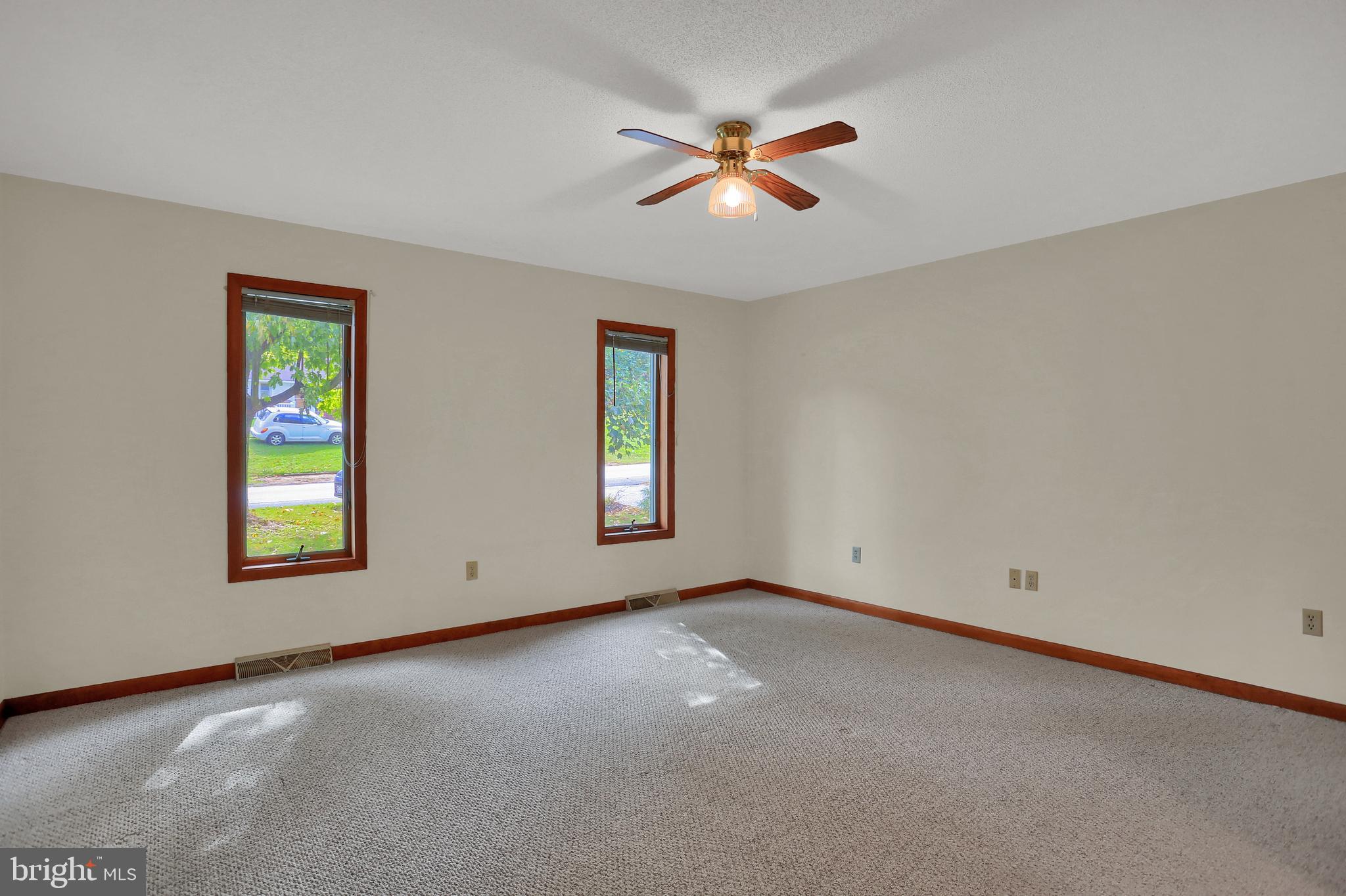 107 Winterstown Road Red Lion, PA 17356 - Photo 26 of 37 a view of empty room with windows