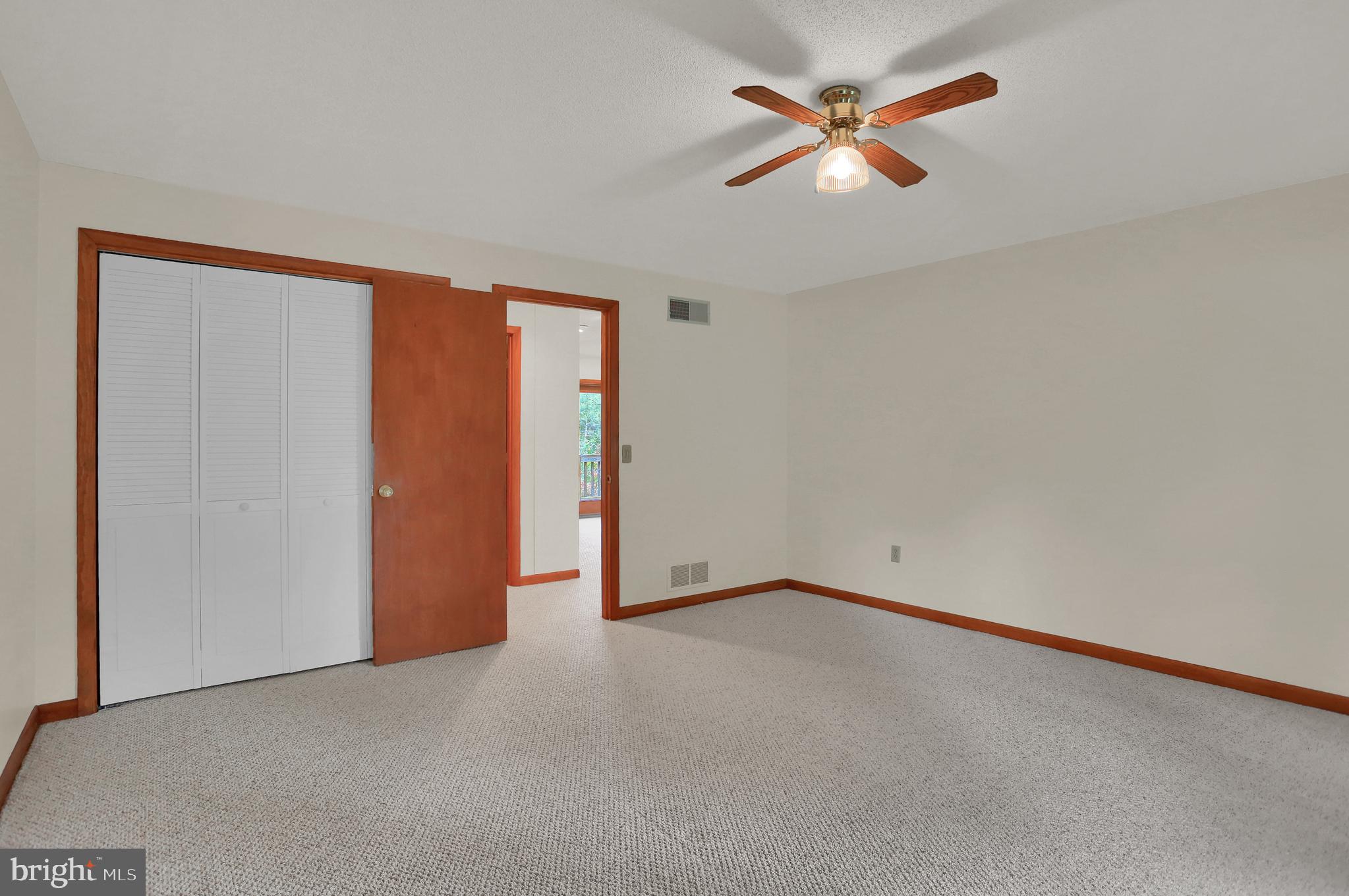 107 Winterstown Road Red Lion, PA 17356 - Photo 28 of 37 an empty room with closet and fan