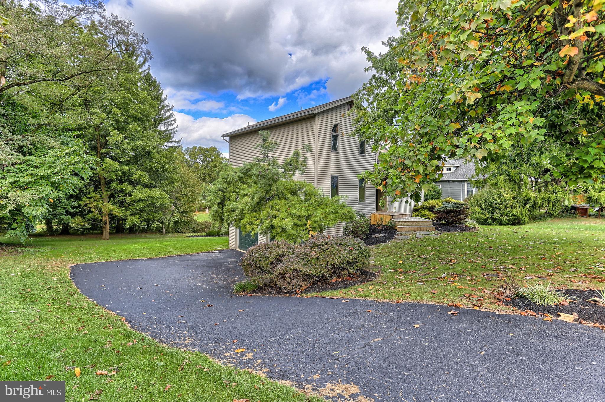 107 Winterstown Road Red Lion, PA 17356 - Photo 4 of 37 a view of a park with large trees