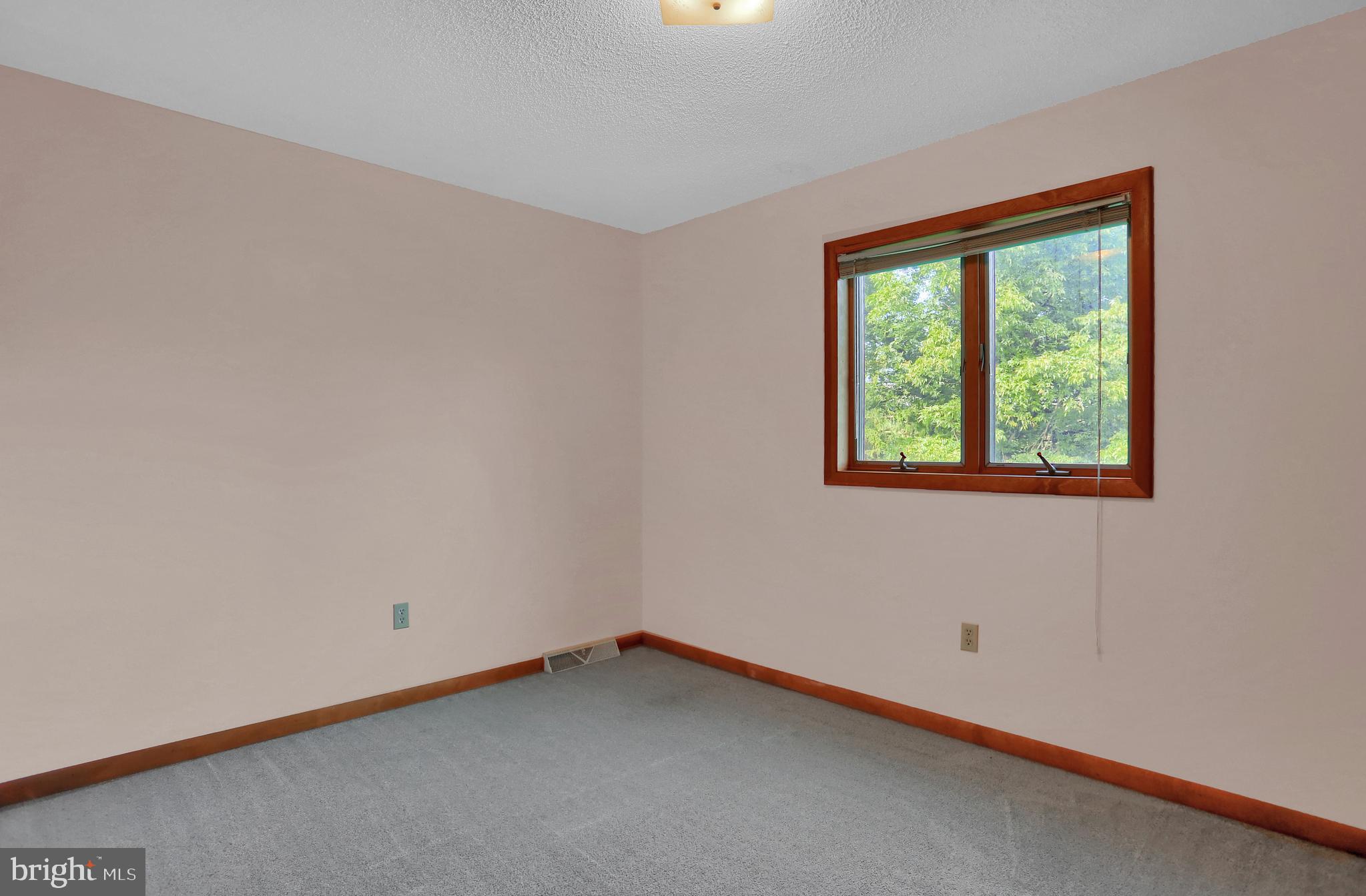 107 Winterstown Road Red Lion, PA 17356 - Photo 32 of 37 an empty room with a window