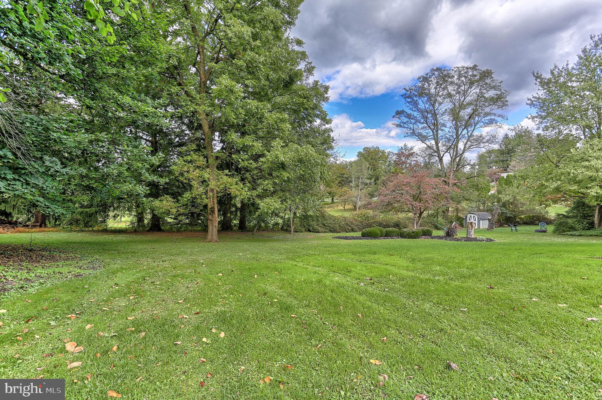 107 Winterstown Road Red Lion, PA 17356 - Photo 6 of 37 a view of a field of grass and trees