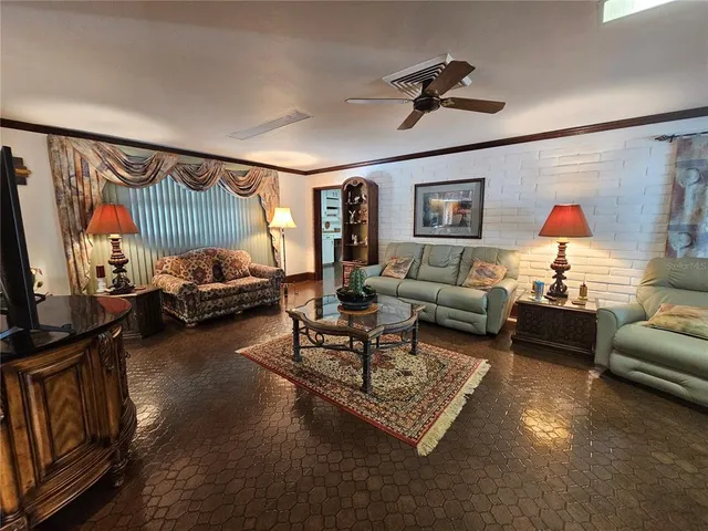 a bathroom with a sink a toilet a mirror and shower