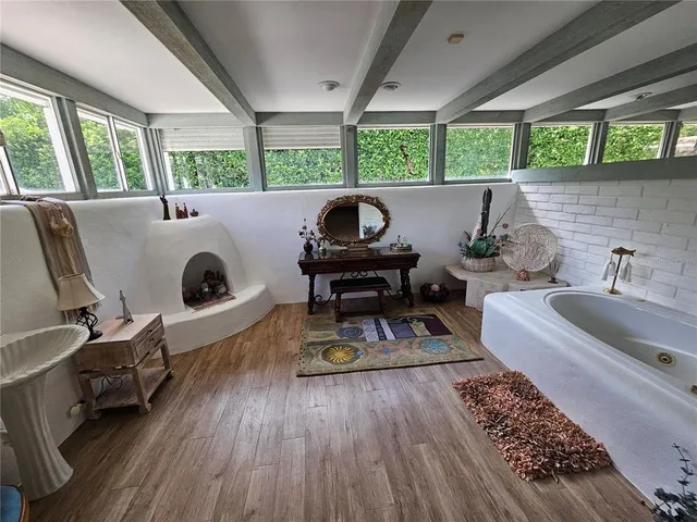 a bathroom with a toilet sink and shower