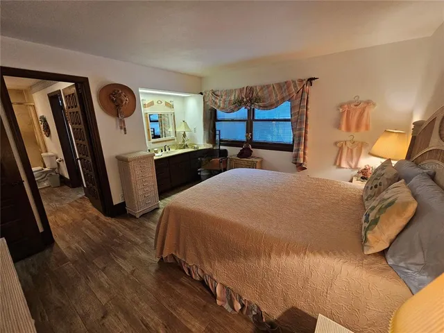 a view of room with furniture and a chandelier