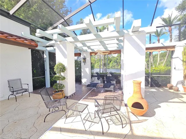 a view of a balcony with a yard