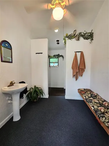 a view of a backyard of the house