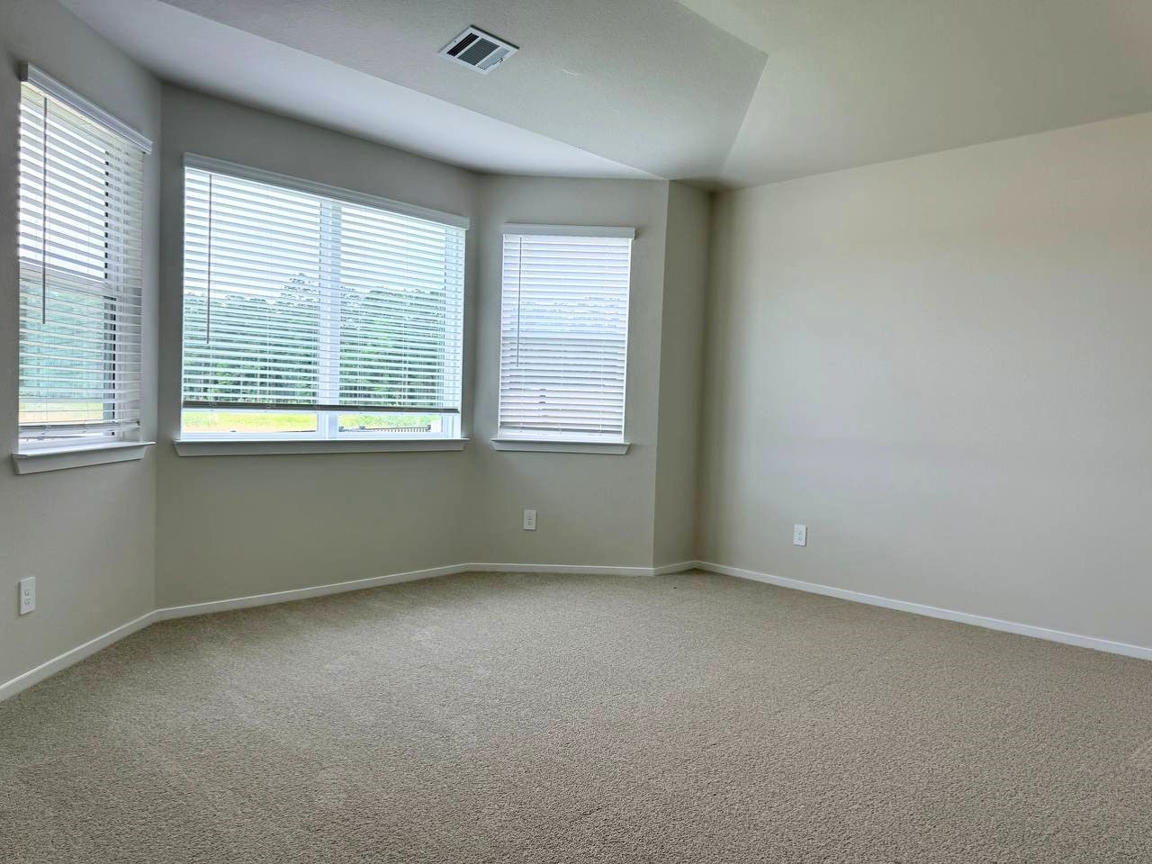 16246 Parish Pointe Court Conroe, TX 77302 - Photo 21 of 32 an empty room with a window