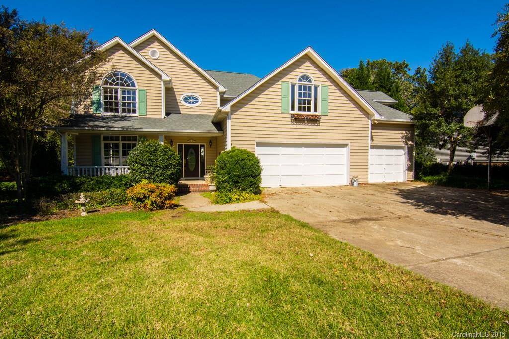 3434 Blue Jay Pass Fort Mill, SC 29708 - Photo 1 of 24 a front view of house with yard and trees in the background