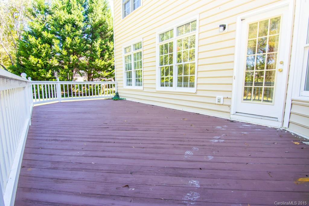 3434 Blue Jay Pass Fort Mill, SC 29708 - Photo 23 of 24 a view of a porch with wooden floor and fence
