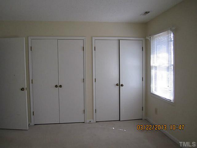 7615 Ladden Court Raleigh, NC 27615 - Photo 15 of 19 an empty room with windows