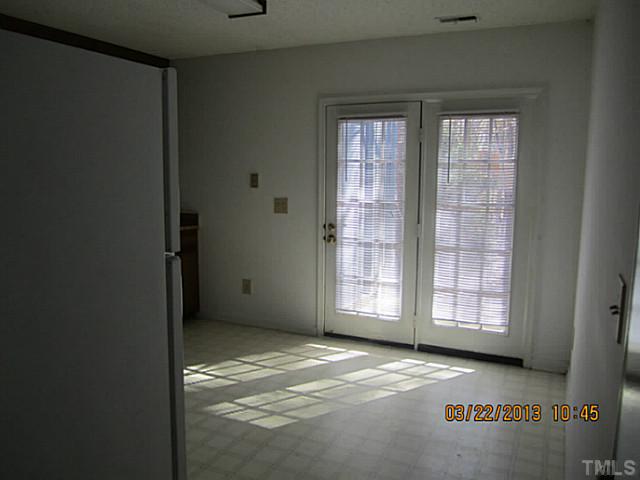 7615 Ladden Court Raleigh, NC 27615 - Photo 9 of 19 a view of an empty room with a window