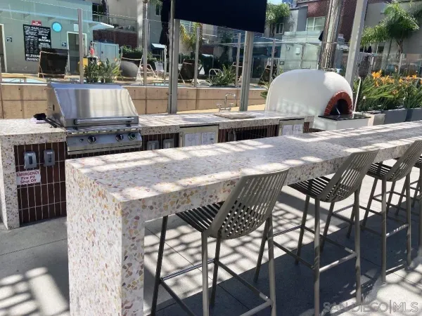 a view of a balcony with chairs