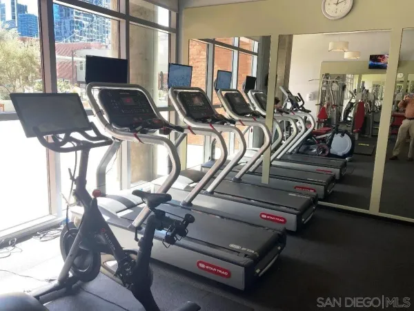 a room with furniture and wooden floor