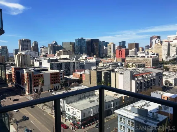 a view of a city with tall buildings