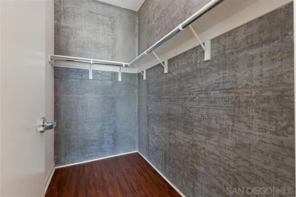 a bathroom with a wooden floor