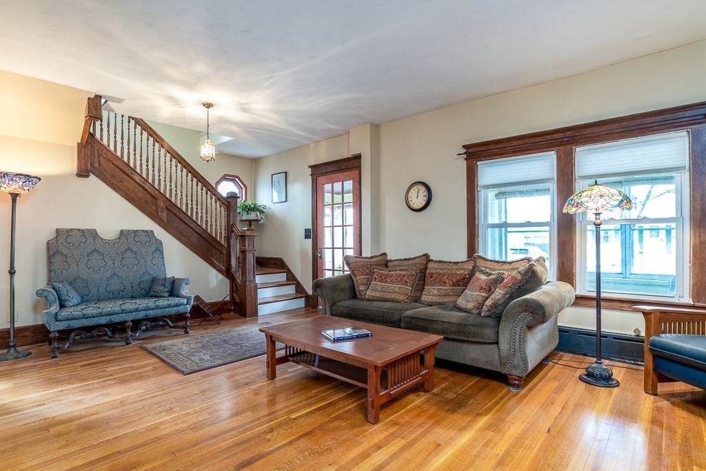 101 Larkspur Street Springfield, MA 01108 - Photo 4 of 35 a living room with furniture and a wooden floor