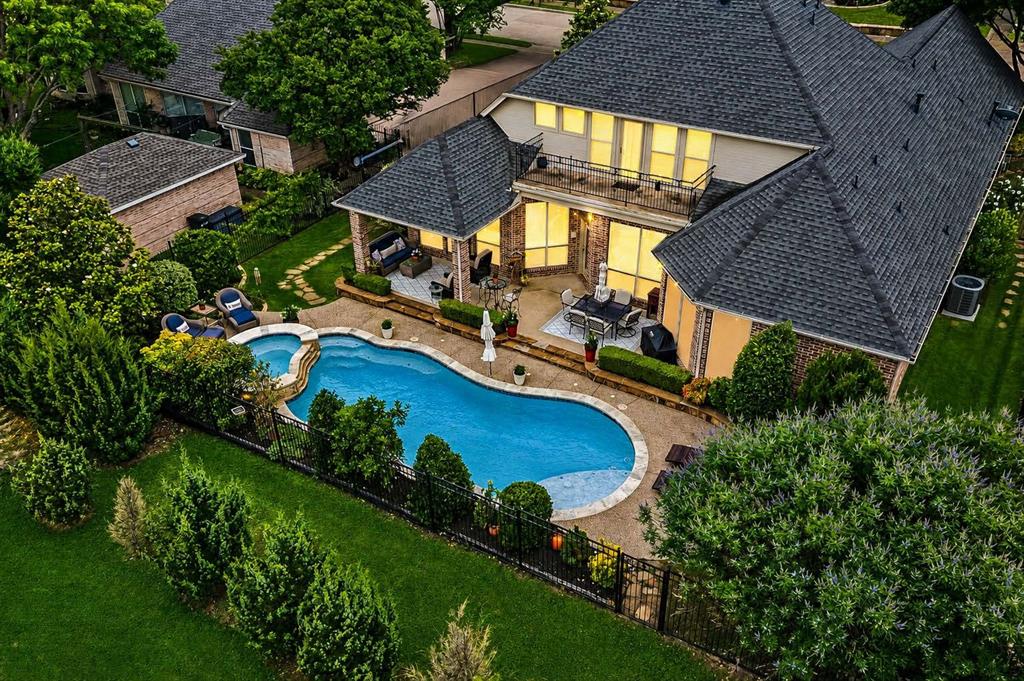 8517 Navigation Drive Rowlett, TX 75088 - Photo 15 of 39 an aerial view of a house with swimming pool and garden