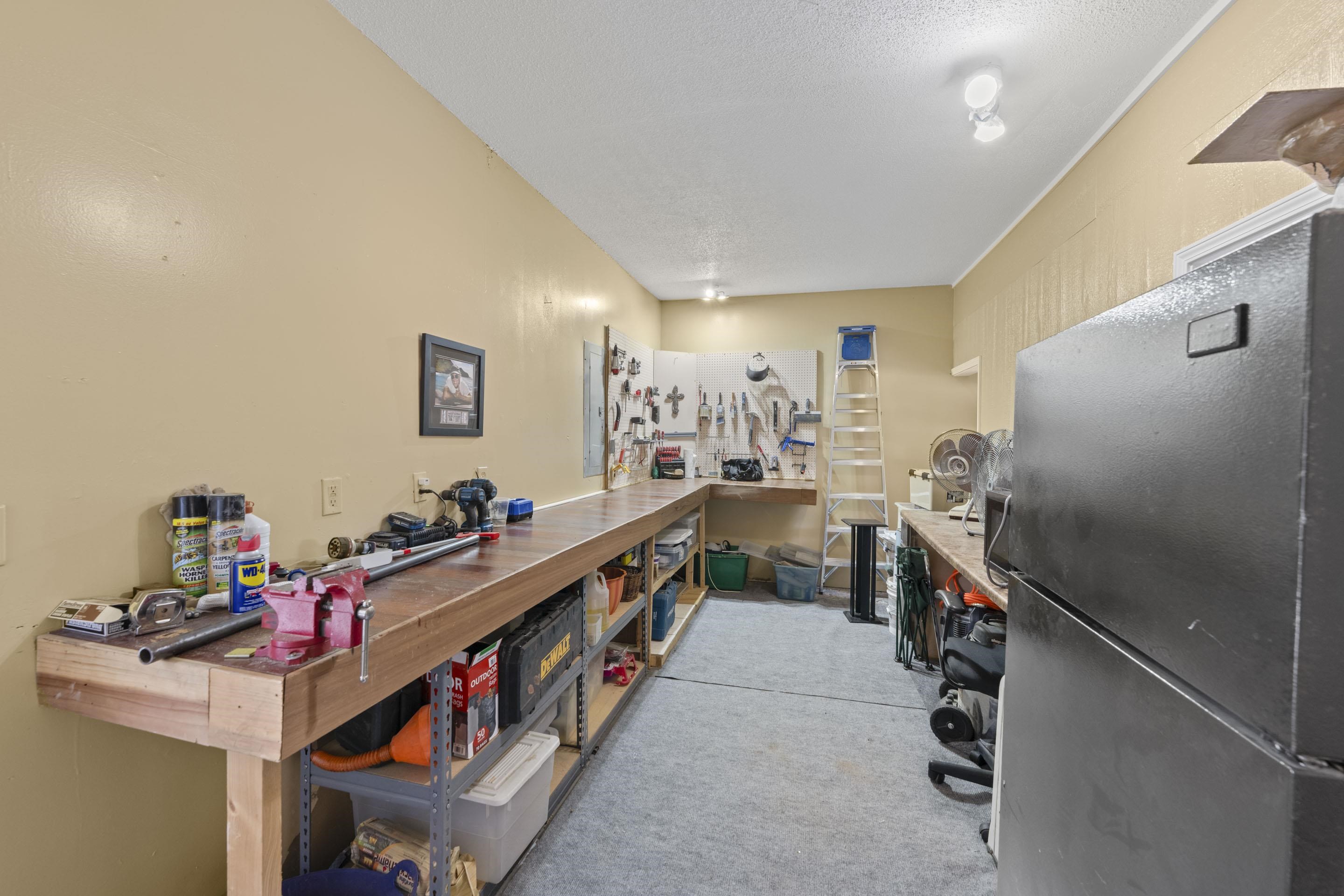 219 North Rose Road Memphis, TN 38117 - Photo 25 of 30 8×12 storage building with electricity—ideal for a workshop, hobby space, or extra storage.