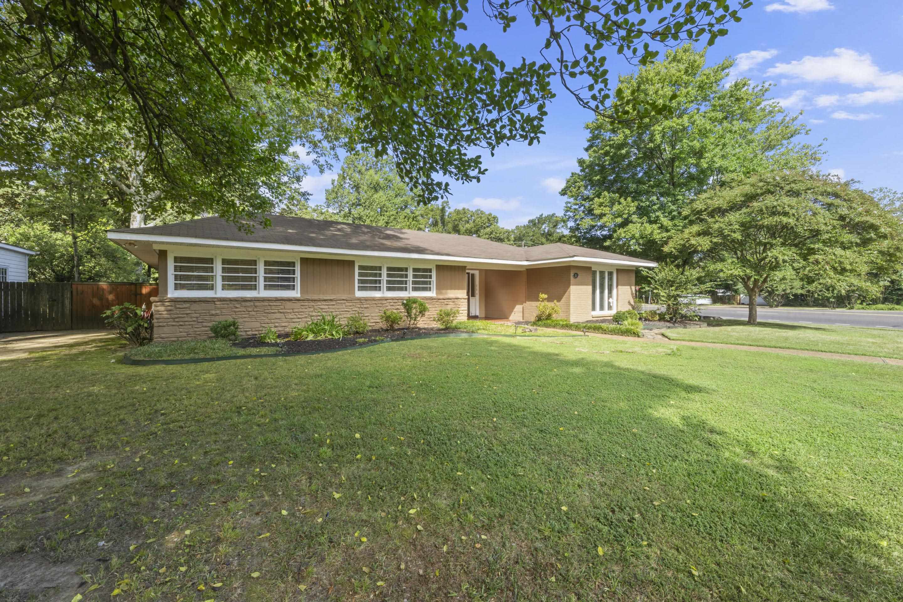 219 North Rose Road Memphis, TN 38117 - Photo 30 of 30 This 3-bedroom, 2.5-bath residence greets you with a gracious tiled entry, setting the tone for the refined finishes throughout, including crown molding and thoughtful storage like a cedar closet and an oversized wine-glass cabinet.