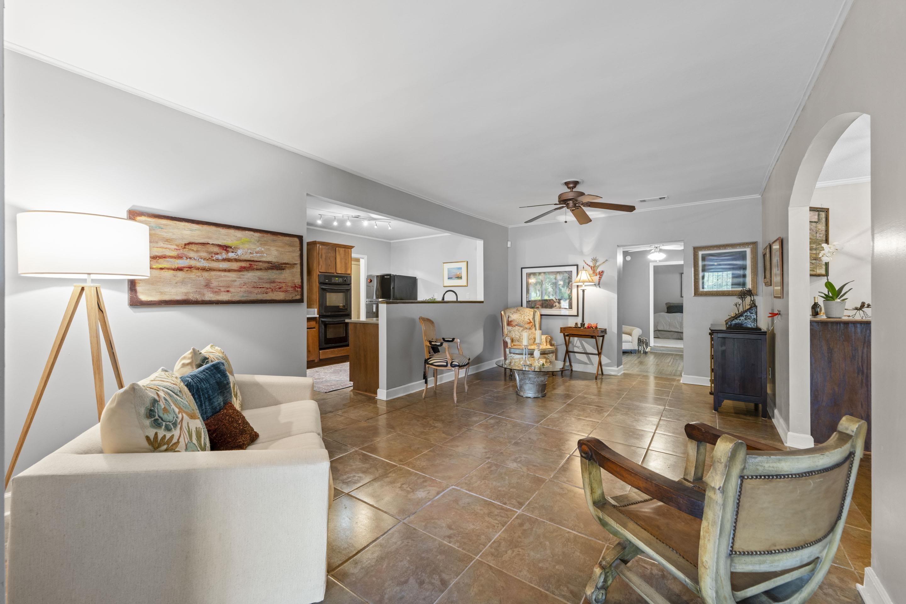 219 North Rose Road Memphis, TN 38117 - Photo 4 of 30 Inviting sitting room that connects seamlessly to the kitchen and great room—ideal for casual entertaining or quiet moments.
