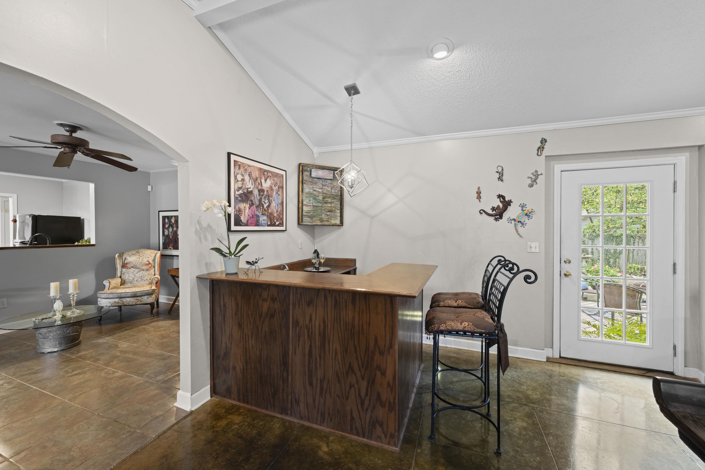 219 North Rose Road Memphis, TN 38117 - Photo 6 of 30 Built-in wet bar with shelving and storage, perfectly positioned for serving guests in the great room.