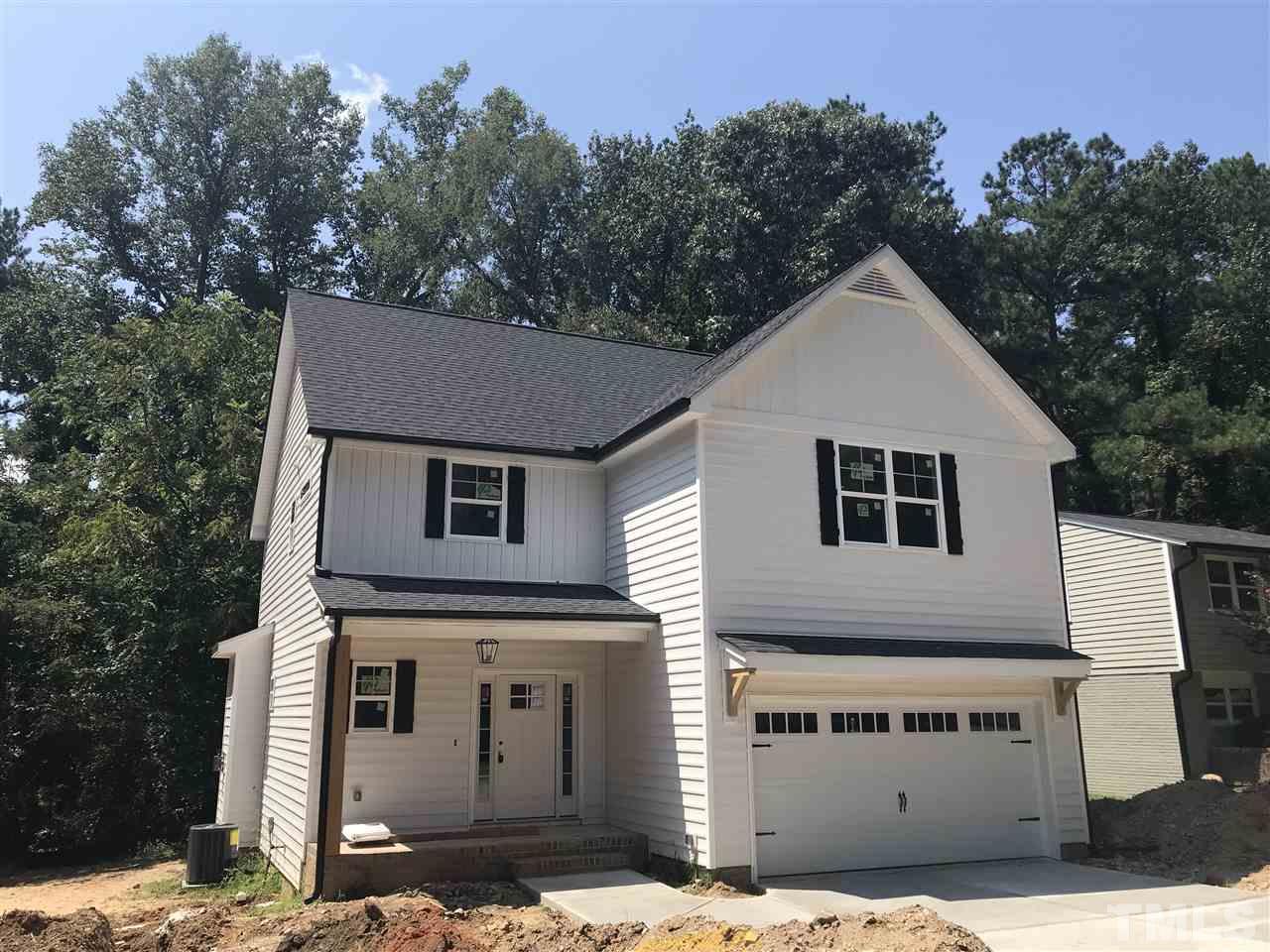 1320 Foxrun Drive Raleigh, NC 27610 - Photo 1 of 24 Garage Door with Glass Panel. Stained Beadboard ceiling on front porch and shed roof. Home built on a crawlspace. Good size driveway for additional parking.