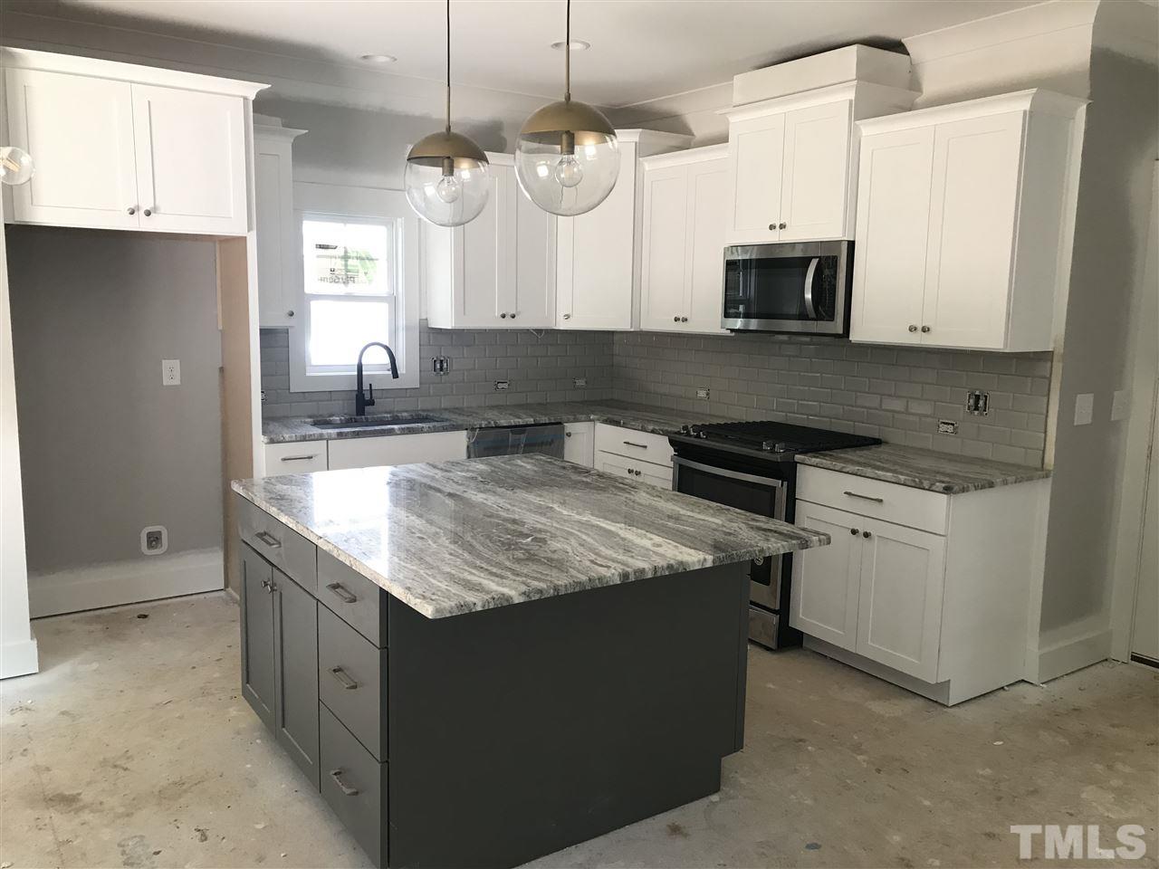 1320 Foxrun Drive Raleigh, NC 27610 - Photo 2 of 24 Granite Countertops, Under Cabinet Lighting, SS appliances, Engineered Hardwood