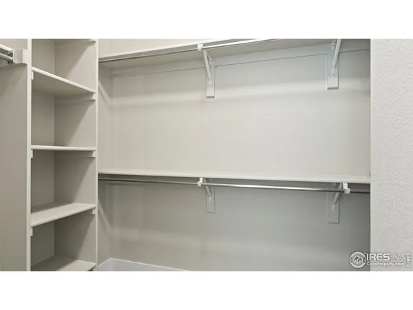 a bathroom with a shower and a sink