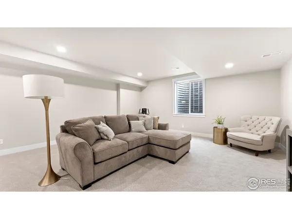 a living room with furniture and a couch