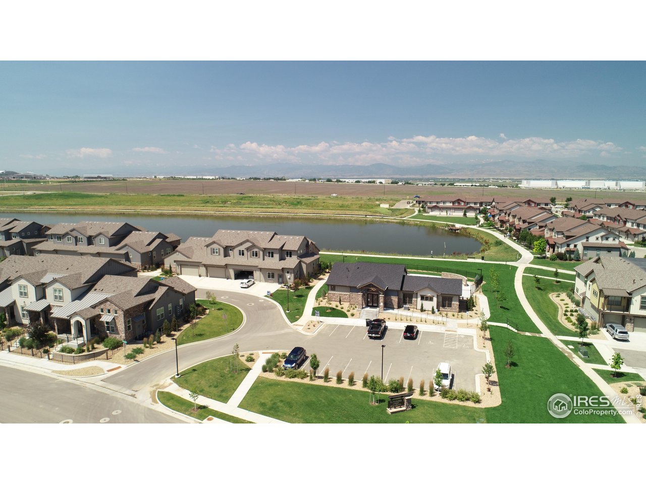 6226 Vernazza Way, Unit 4 Windsor, CO 80550 - Photo 30 of 33 a picture of a ocean view with beach