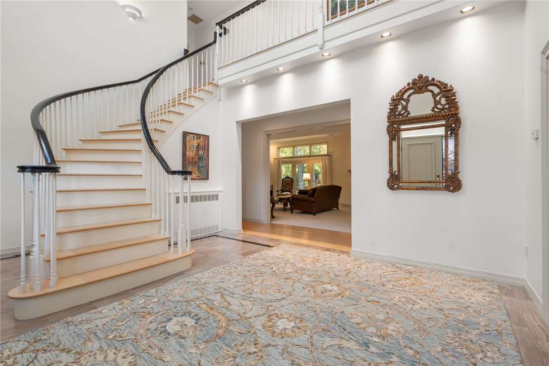 7 Oak Tree Lane Cranston, RI 02920 - Photo 2 of 32 Grand Two Story Entrance with circular stairwell