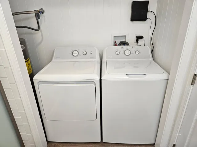 a utility room with dryer and washer