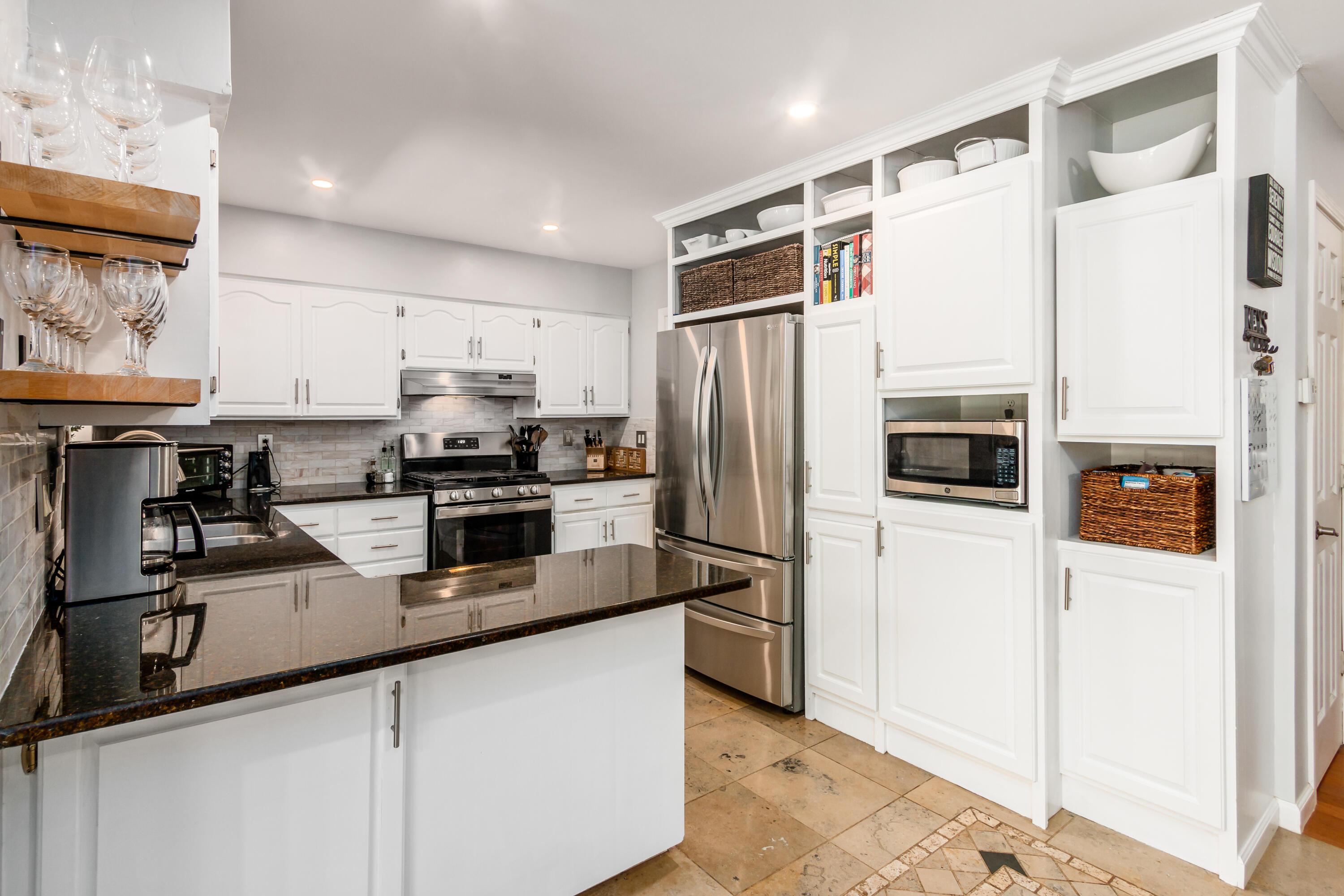 5165 Tussic St Road Westerville, OH 43082 - Photo 25 of 62 New can lights in the ceiling allow fro a bright kitchen
