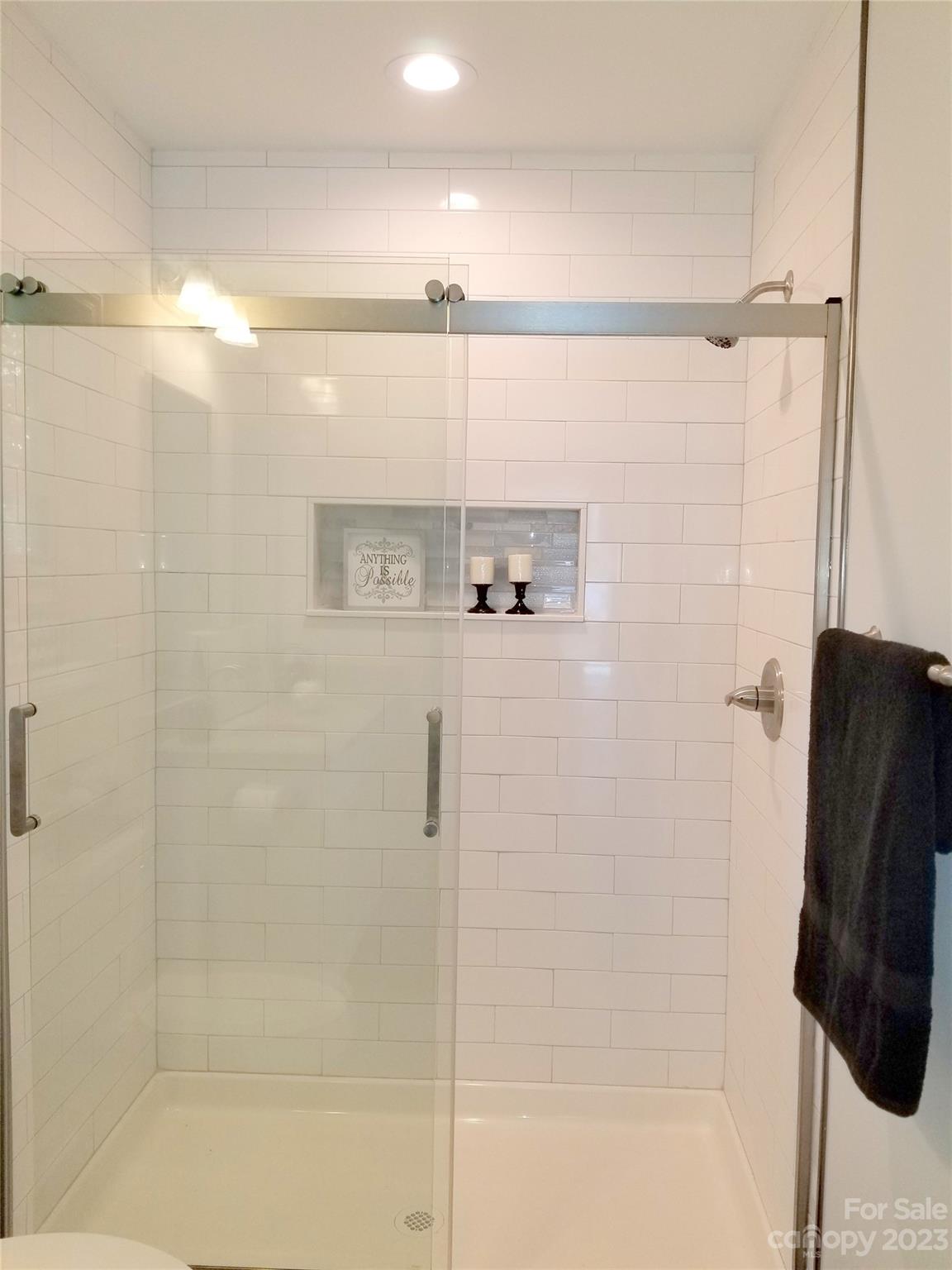 121 Hawkins Loop Salisbury, NC 28144 - Photo 11 of 31 a bathroom with a shower and a shower