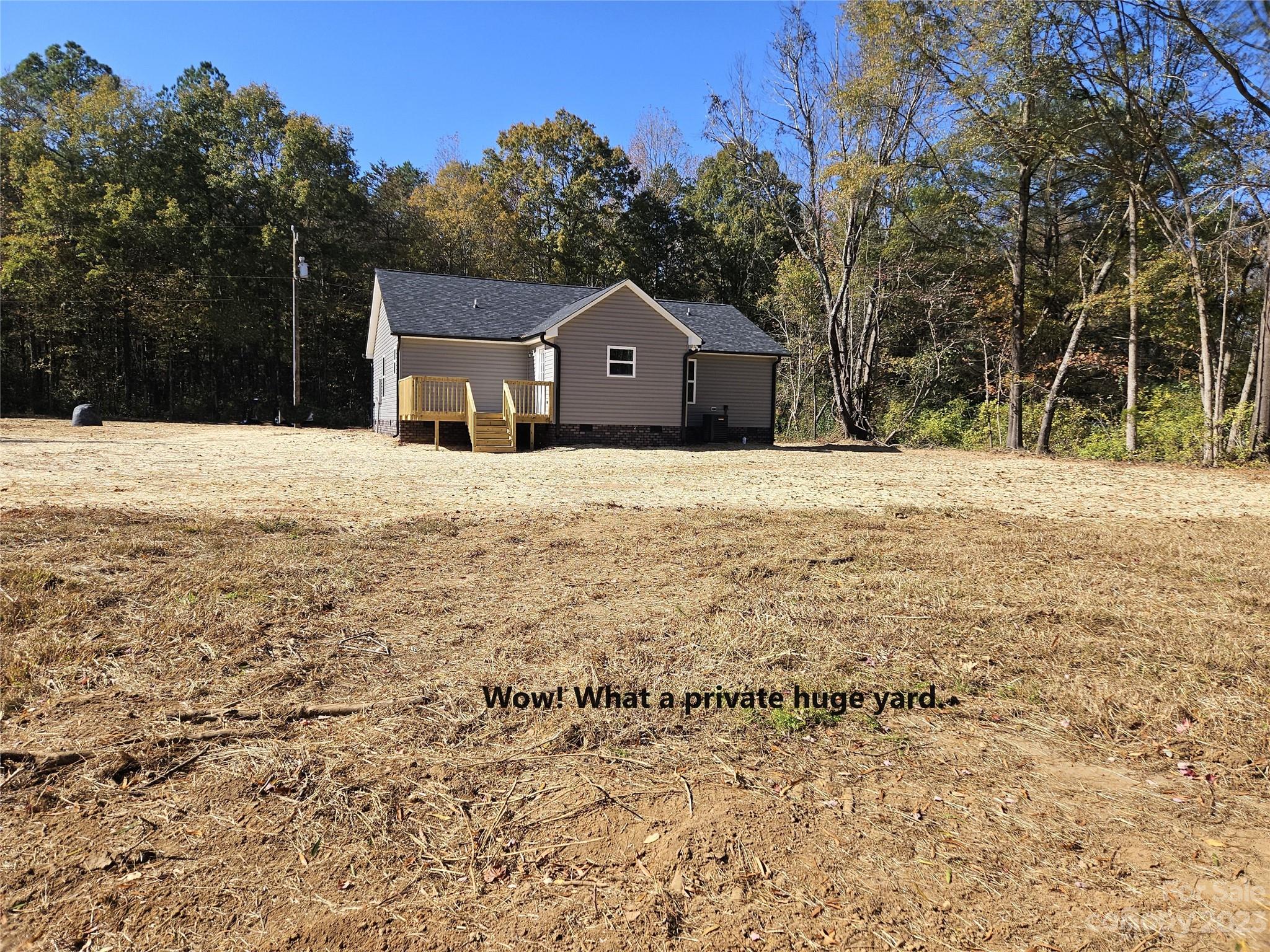 121 Hawkins Loop Salisbury, NC 28144 - Photo 17 of 31 a front view of a house with a yard and garage