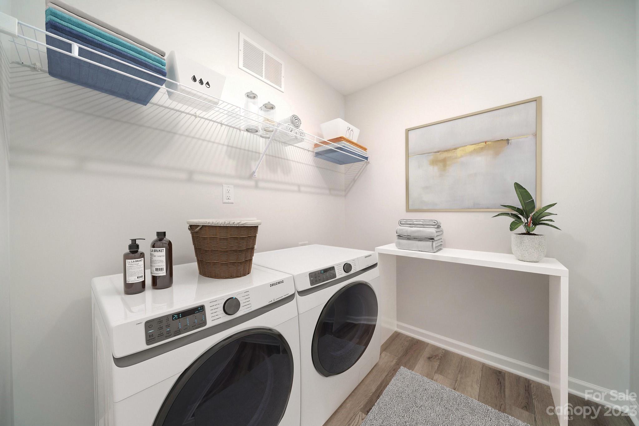 121 Hawkins Loop Salisbury, NC 28144 - Photo 22 of 31 a utility room with sink dryer and washer