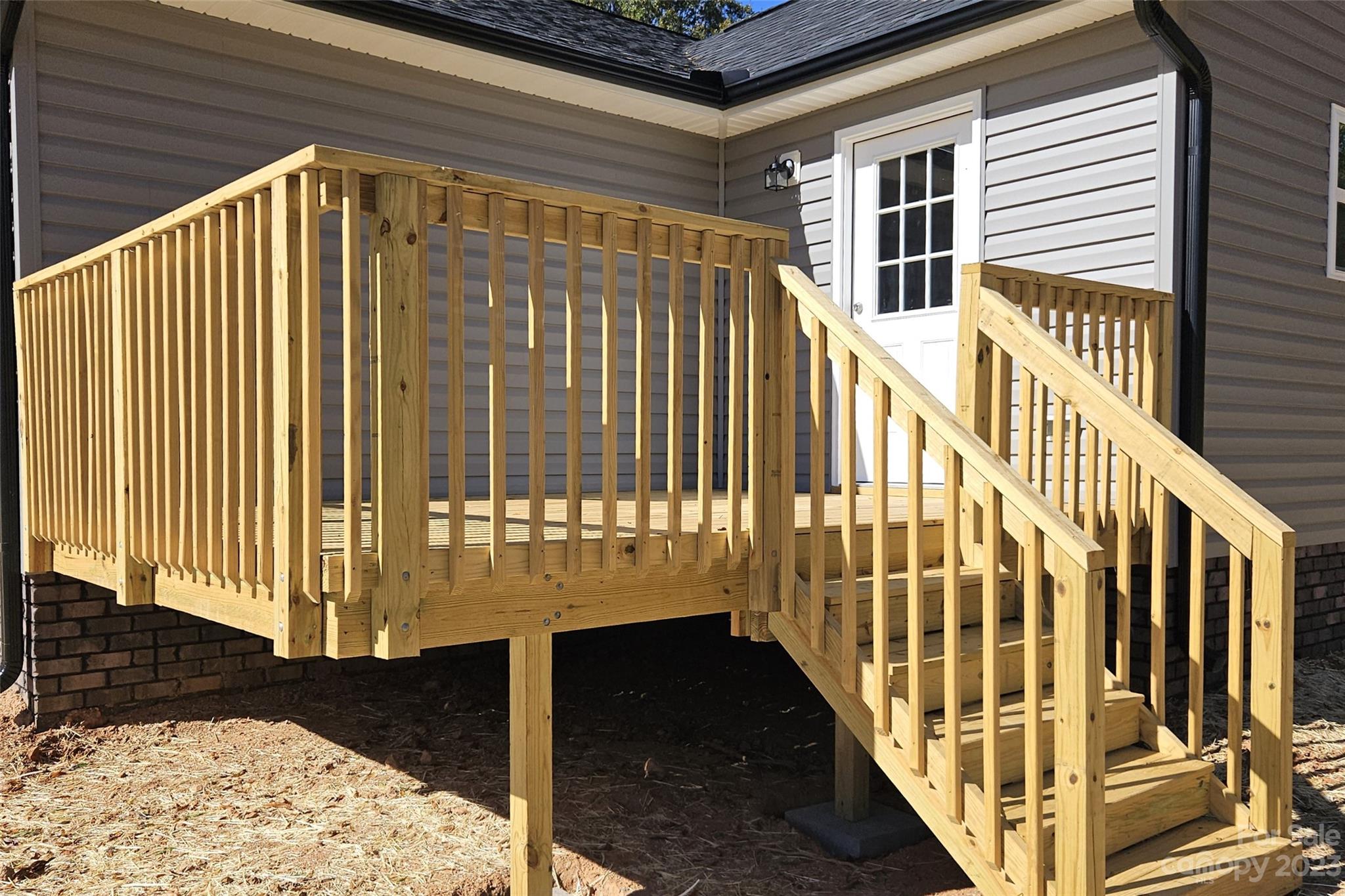 121 Hawkins Loop Salisbury, NC 28144 - Photo 28 of 31 a view of staircase with railing and a rug
